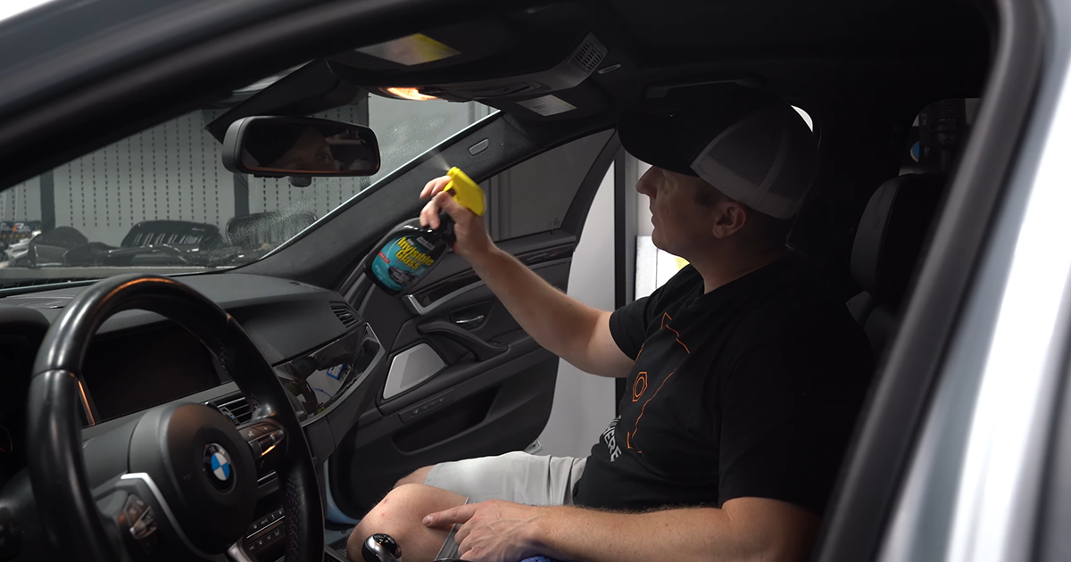 Deep cleaning your windshield like never before with Invisible Glass Glass  Stripper. 